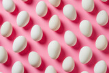 Eggs arranged in a row on pink background, top view, Easter concept 1520 words, under 190 characters