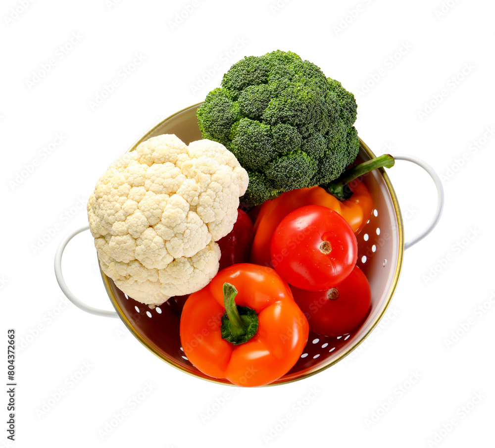 Colander with fresh vegetables isolated on white, top view Colander with fresh vegetables isolated on white, top view