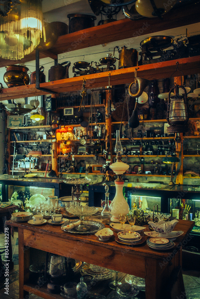 An antique shop with vintage items lining the shelves, showcasing antique treasures.