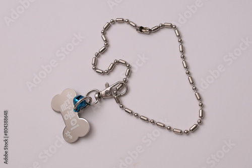a cat and dog's name tag necklace
