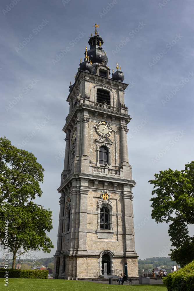 The beautiful Baroque style Belfry of Mons, in Hainaut, Belgium. Built in 1672 it overlooks the city in Parc de Chateau. The beautiful Baroque style Belfry of Mons, in Hainaut, Belgium. Built in 1672 it overlooks the city in Parc de Chateau.
