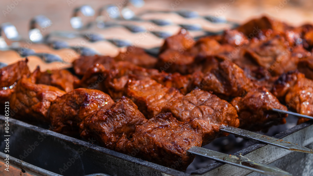 Marinated skewers are prepared on a barbecue grill over charcoal. Shish kebab or shish kebab is popular in Eastern Europe. Shish kebab was originally made from mutton. BBQ grilled beef kebab. 