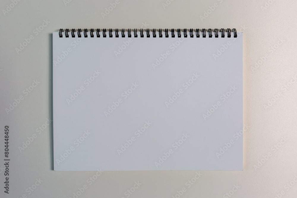 Blank open pocket book, catalog, magazine, note mock up template white paper texture on wood table Blank open pocket book, catalog, magazine, note mock up template white paper texture on wood table