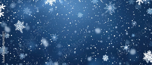 Falling snowflakes snowing winter blue background