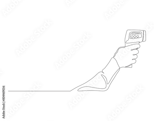 Continuous line drawing of hand hold infrared digital thermometer. One line of infrared digital thermometer. Medical equipment, International health day concept continuous line art. Editable outline.