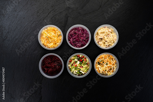 Assorted bowls of fresh healthy salads