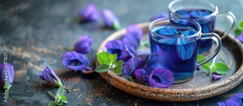 Cup of Tea With Blue Flowers on a Plate