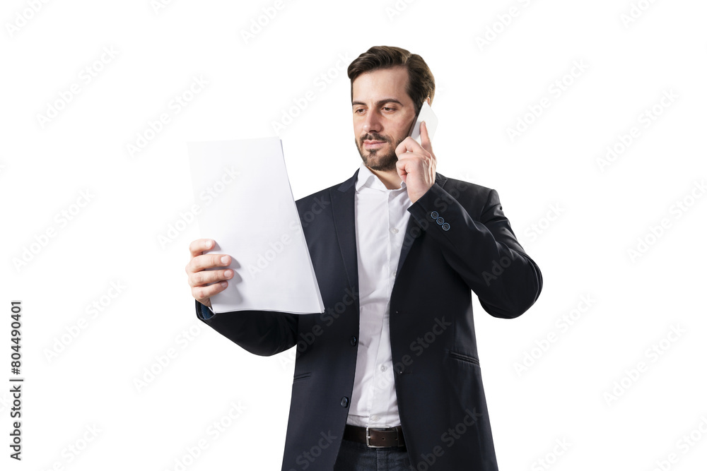 A businessman in a suit holding a blank sheet of paper and talking on a mobile phone against a white background A businessman in a suit holding a blank sheet of paper and talking on a mobile phone against a white background