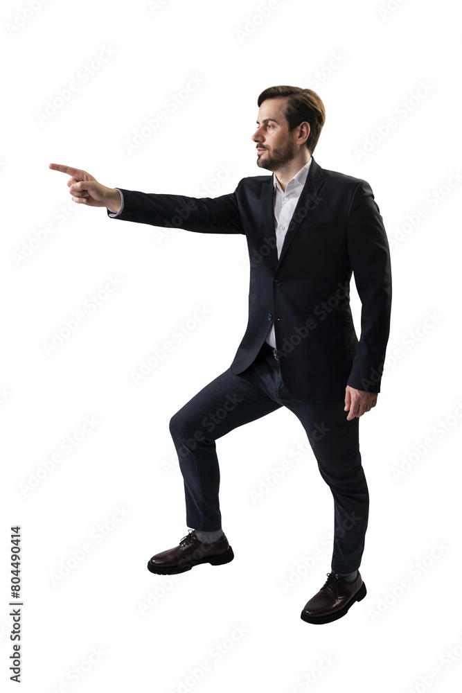 Man in a suit striking a pointing pose, photographed in a studio on a white background, portraying confidence and direction Man in a suit striking a pointing pose, photographed in a studio on a white background, portraying confidence and direction