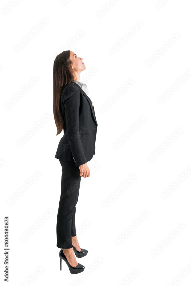 A woman in business attire looking upwards, isolated on a white background, portraying aspiration or inspiration A woman in business attire looking upwards, isolated on a white background, portraying aspiration or inspiration
