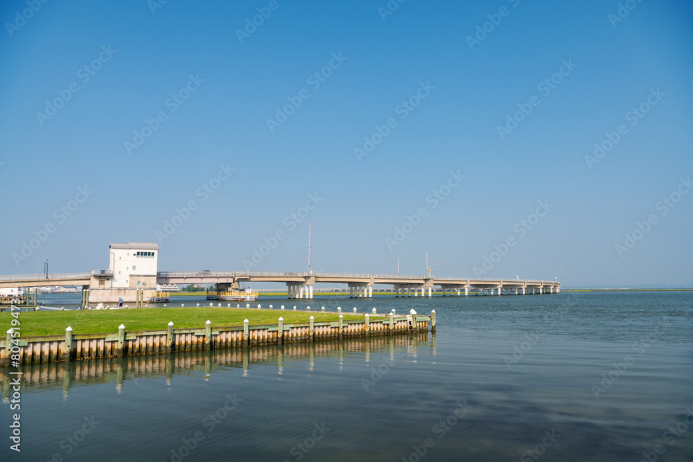 Long bridge across the bay at Chincoteague Island, a sanctuary with rare birds in the swamps. Long bridge across the bay at Chincoteague Island, a sanctuary with rare birds in the swamps.