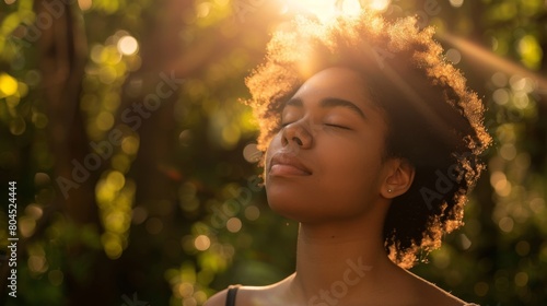 Woman Embracing Golden Sunlight