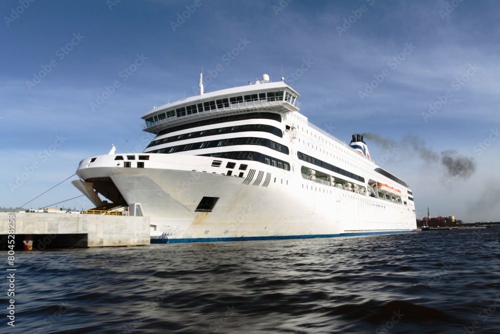 Front view of a cruise on Daugava river in Riga, Latvia Front view of a cruise on Daugava river in Riga, Latvia