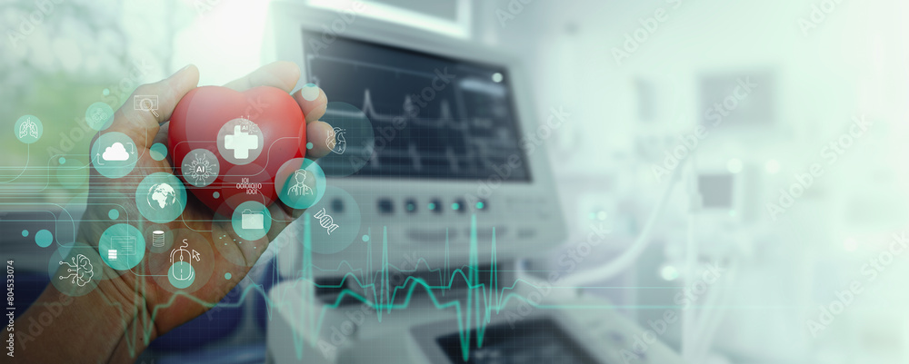 Heart Check up by AI-powered ECG analysis, Risk assessment, Early detection, Hand holding Virtual hearth in medical hospital lab monitor background.