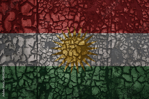 flag of kurdistan on a old grunge metal rusty cracked wall background