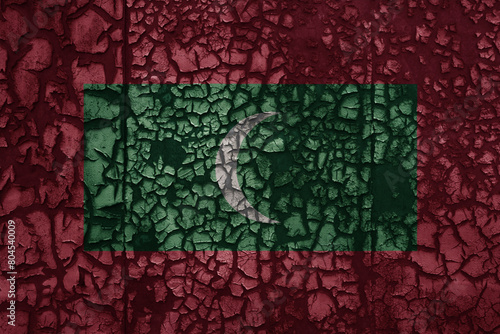 flag of maldives on a old grunge metal rusty cracked wall background
