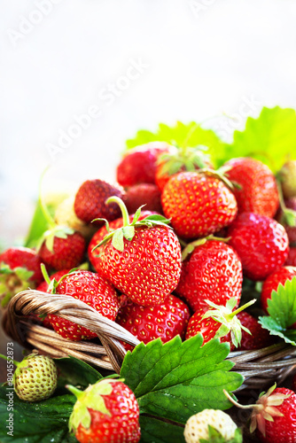 Fresh ripe summer organic strawberry on rustic wooden background