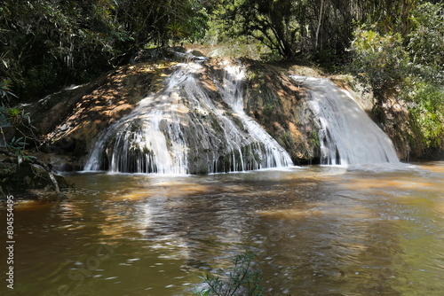 Waterfall of the Rio Melodioso River that forms the Poza el Venado Pool swimming spot on the Centinelas Hike, Guanayara Park. Cienfuegos-Cuba-221