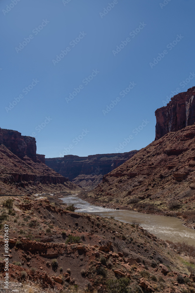 Blue skies and Red Cliffs of Utah's Castle Valley with the Colorado River Below in Spring