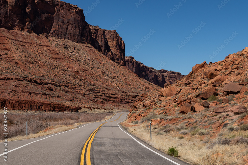 Utah Highway 128 with Red Cliffs and buttes of Castle Valley Area in spring Utah Highway 128 with Red Cliffs and buttes of Castle Valley Area in spring