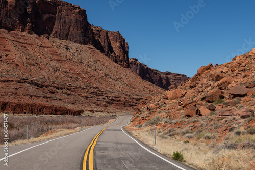 Utah Highway 128 with Red Cliffs and buttes of Castle Valley Area in spring 