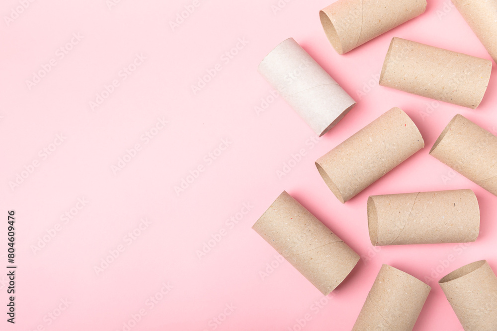 Empty toilet paper roll. Rolls of toilet paper on background. Paper tube of toilet paper. Place for text. Copy space. Flat lay. Eco-friendly reuse recycle Empty toilet paper roll. Rolls of toilet paper on background. Paper tube of toilet paper. Place for text. Copy space. Flat lay. Eco-friendly reuse recycle