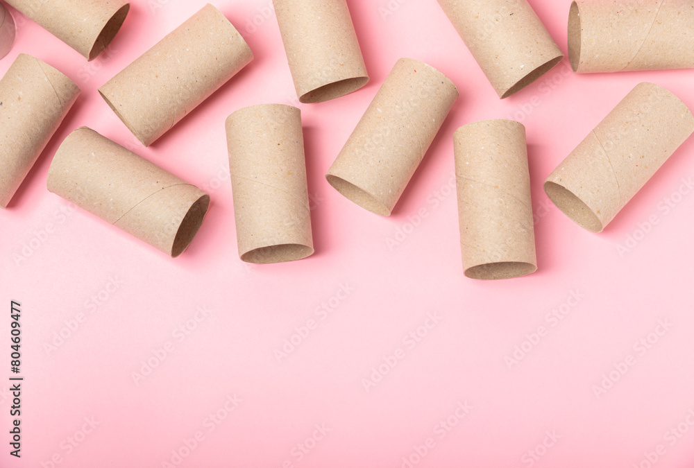 Empty toilet paper roll. Rolls of toilet paper on background. Paper tube of toilet paper. Place for text. Copy space. Flat lay. Eco-friendly reuse recycle Empty toilet paper roll. Rolls of toilet paper on background. Paper tube of toilet paper. Place for text. Copy space. Flat lay. Eco-friendly reuse recycle