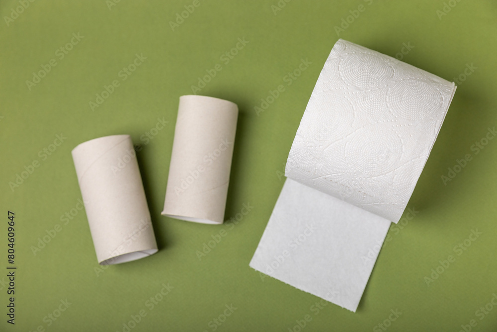 Empty toilet paper roll. Rolls of toilet paper on background. Paper tube of toilet paper. Place for text. Copy space. Flat lay. Eco-friendly reuse recycle Empty toilet paper roll. Rolls of toilet paper on background. Paper tube of toilet paper. Place for text. Copy space. Flat lay. Eco-friendly reuse recycle