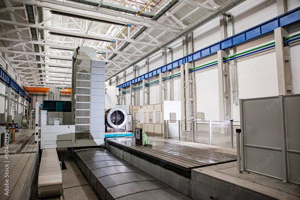 Naklejka premium the factory interior , a modern light metalworking hangar warehouse with equipment