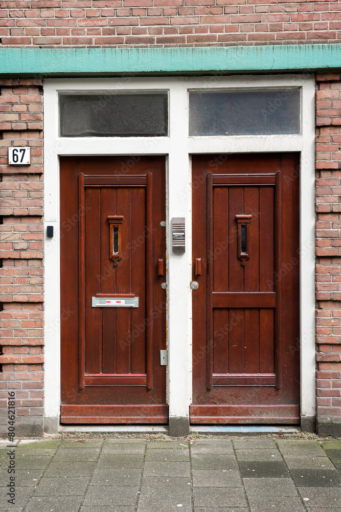 Entrance door of a typical Dutch house. Amsterdam housing concept. Entrance door of a typical Dutch house. Amsterdam housing concept.