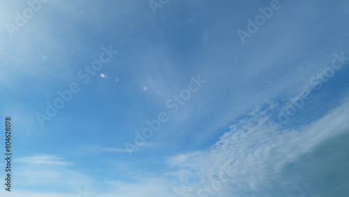 Blue sky with altostratus clouds. Beautiful blue sky with altostratus clouds background. Timelapse. photo