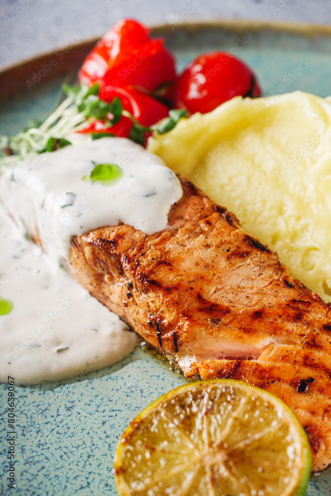 delicious grilled salmon steak with cream sauce
