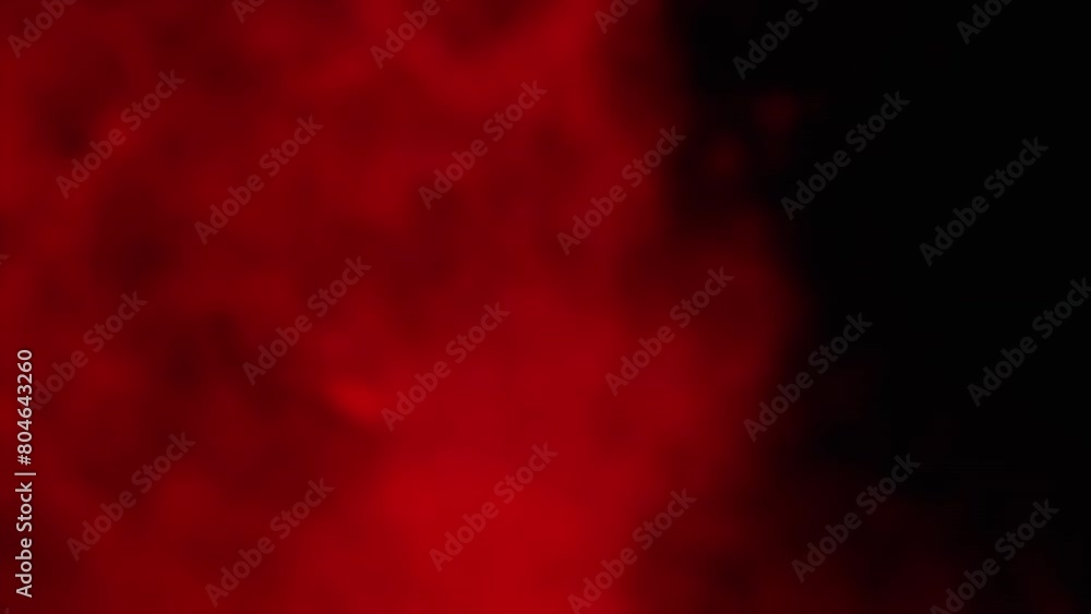 Explosion of Red Smoke or Vapor on Black Blurred Background. Abstract. Full. Flash. Soft puffs of smoke or steam mix chaotically on empty space. Particle explosion, bright light. Slow motion. Explosion of Red Smoke or Vapor on Black Blurred Background. Abstract. Full. Flash. Soft puffs of smoke or steam mix chaotically on empty space. Particle explosion, bright light. Slow motion.