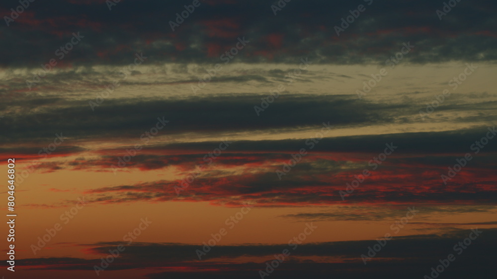 Fototapeta premium Summer sky at sunset with clouds. Cloudscape in tropical summer sunlight. Timelapse.