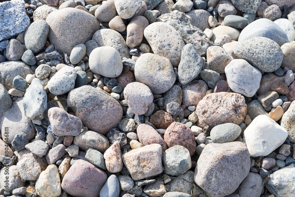 Pebbles and round stones on the beach, typical of the Baltic Sea Pebbles and round stones on the beach, typical of the Baltic Sea