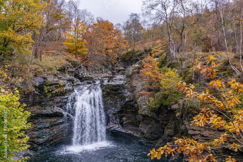 Falls Of Falloch in a colorful autumn gloomy beautiful day