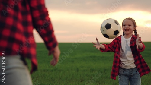 mother playing with child kid soccer field, child playing soccer ball with parent green lawn, happy family, sunny day football, young soccer player, soccer training alone, football game outside, open