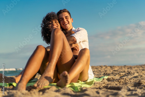 Joyful Young Couple Embracing on Beach - Summer Love (ID: 804663672)