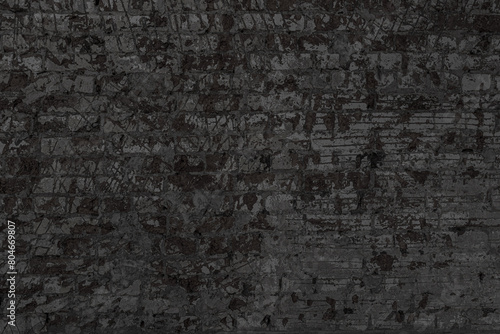 Texture of an old black brick wall. Abstract construction background.