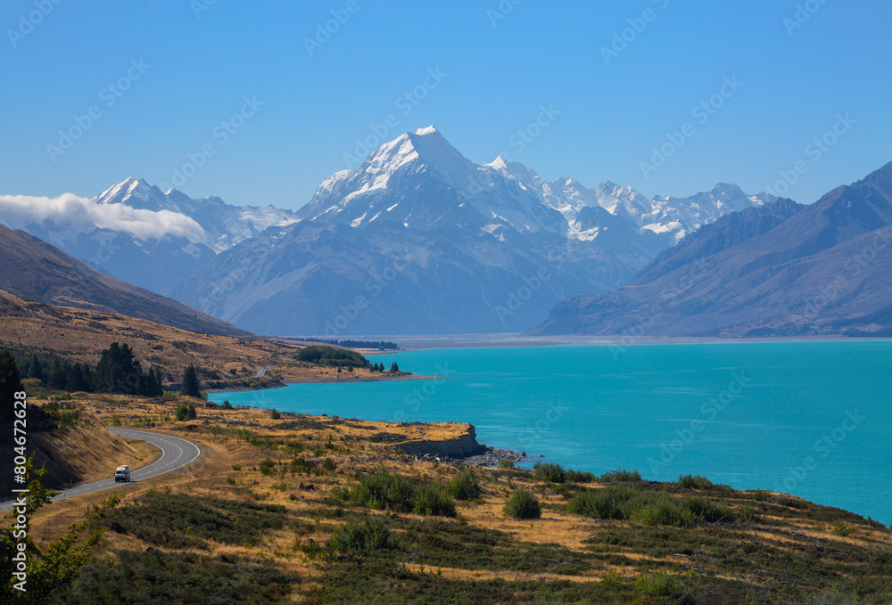 Postcard view of New Zealand's Mt. Cook and Lake Pukaki, which gets its brilliant color from glacial silt. 
