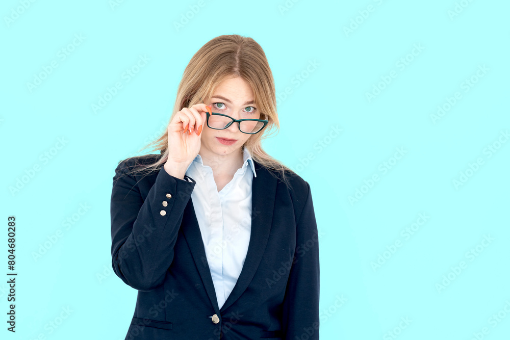 Attractive blonde businesswoman standing isolated on white background Attractive blonde businesswoman standing isolated on white background