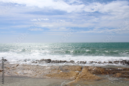 waves on the seanatural background of sky, sea and rocks, Mediterranean coast in Spain,