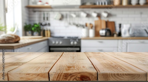 Wooden table top on blur kitchen room background  Modern kitchen room interior