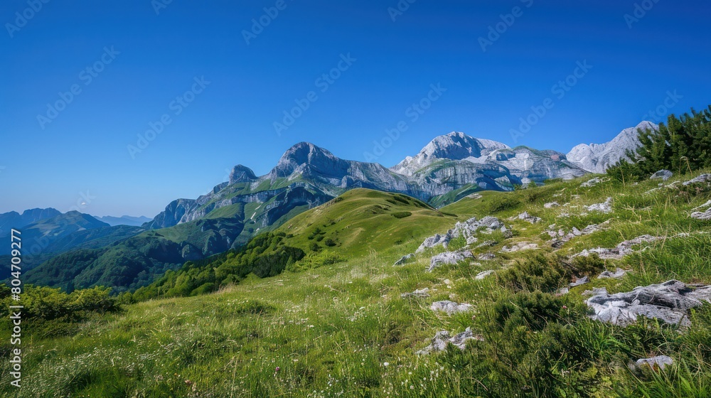 A stunning sunny day showcases the idyllic beauty of alpine mountains with vibrant greenery A stunning sunny day showcases the idyllic beauty of alpine mountains with vibrant greenery