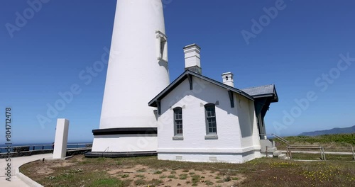 Yaquina Head Lighthouse against blue sky in Oregon state, USA. photo