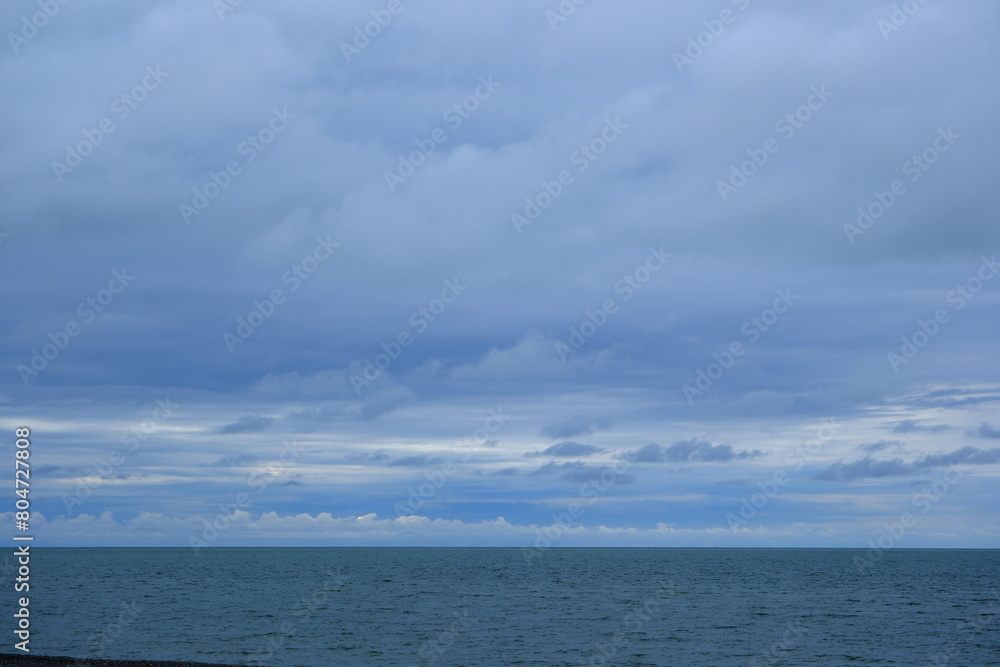 clouds over the sea. Stormy sky over the sea in the evening. clouds over the sea. Stormy sky over the sea in the evening.