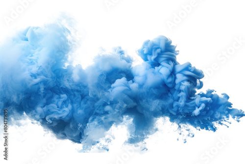 Vivid blue ink clouds dispersing on transparent background.