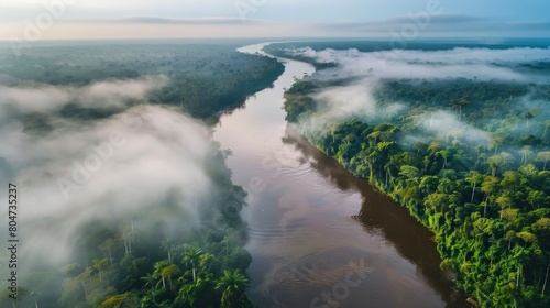 Beautiful sunset on the Amazon River with fog in high resolution and high quality. aerial view © Marco