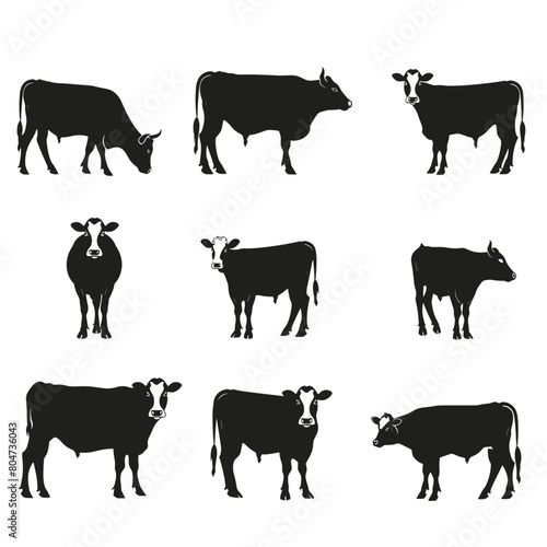 A black and white silhouette of several cows facing left