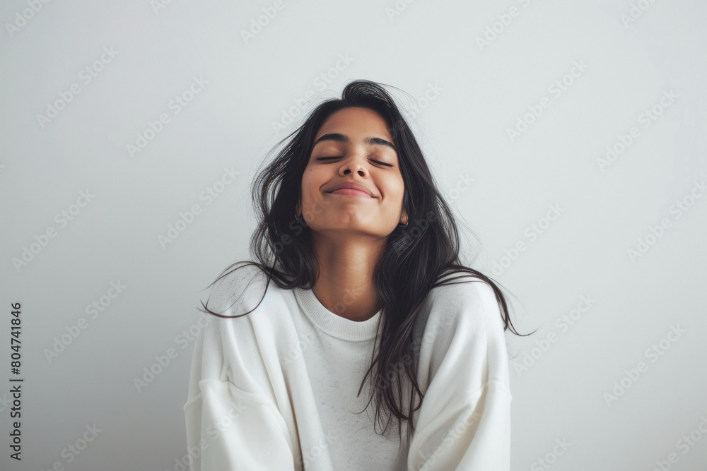 Beautiful indian woman smiling on white background Beautiful indian woman smiling on white background